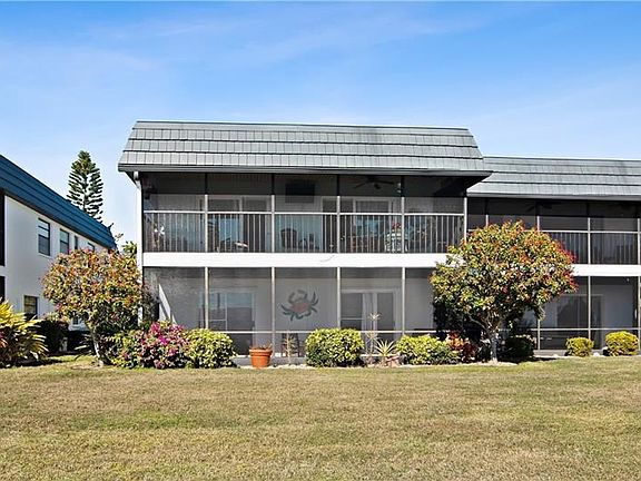 Back of condo, facing south and the salt-water canal.