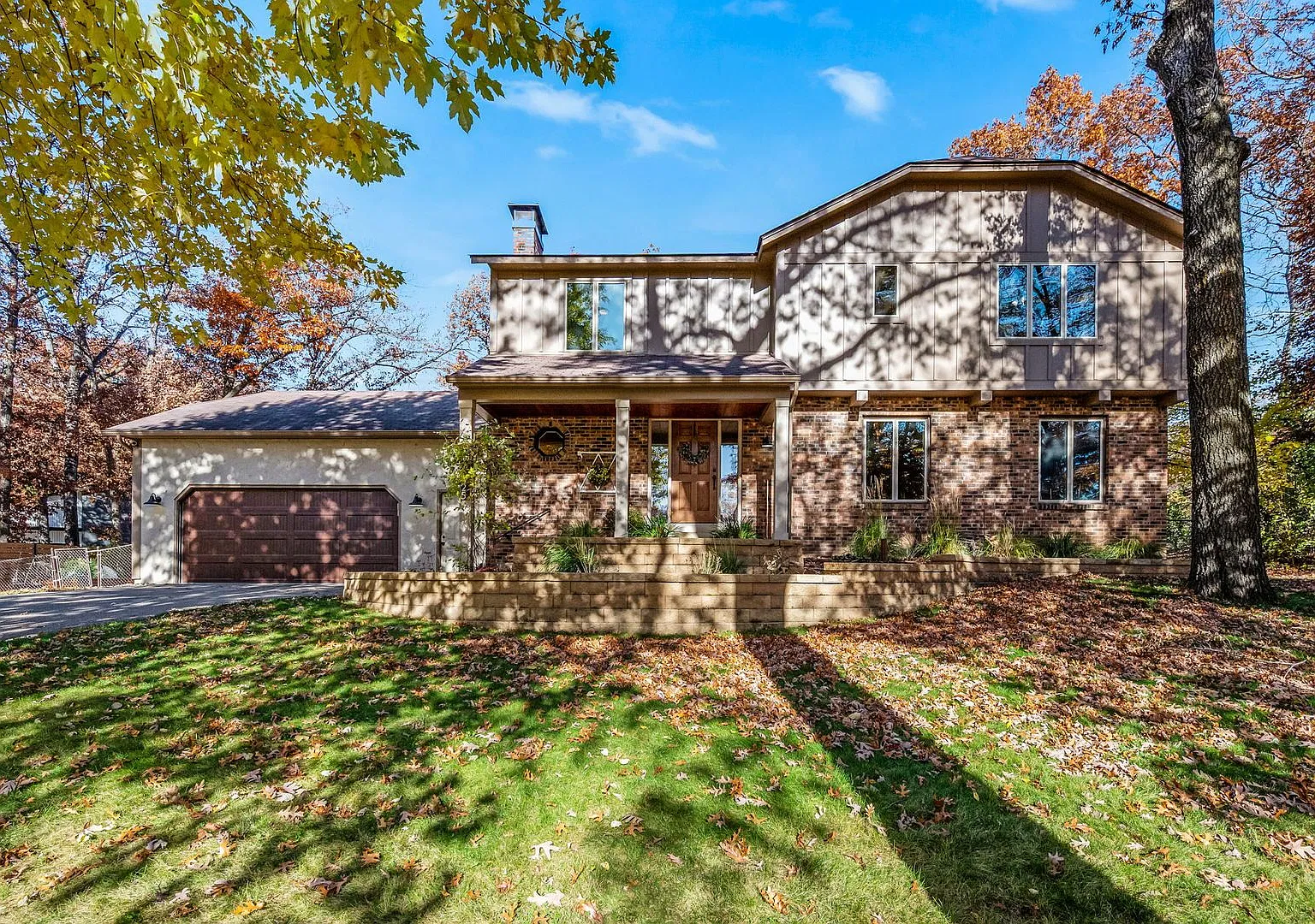 Stunning Remodeled 4BR Home w/ Pond View & 3-Seasons Porch! — Photo 3