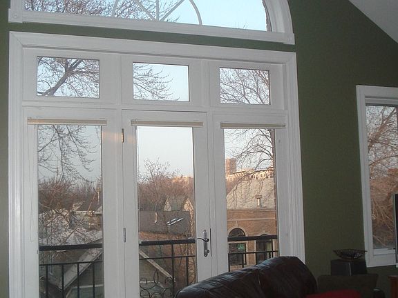 15' Arch Window and French door and windows