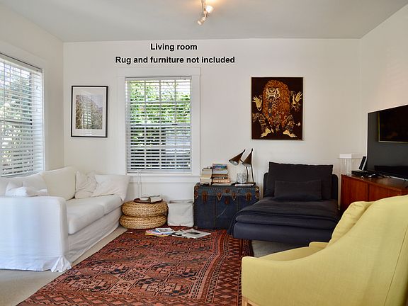 Roomy living room. Furniture is not included. Brand new gray berber style carpet.