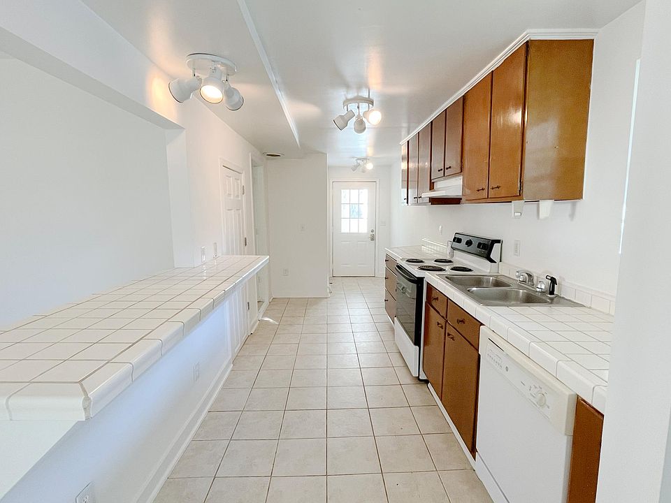 Kitchen. Main entry door in background.