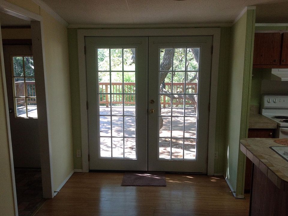 DOUBLE FRENCH DOORS OPEN UP TO LARGE 24' X 46 ' CEDAR WOOD DECK