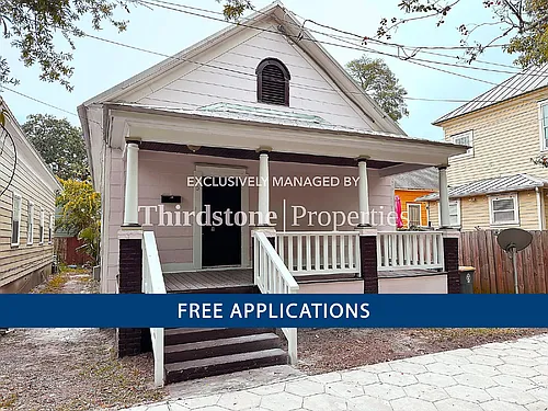 210 E 9th St Photo 1