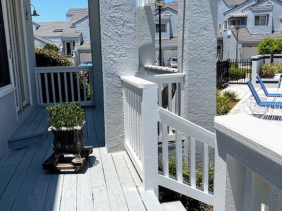 Back deck accessible from living room and dining room