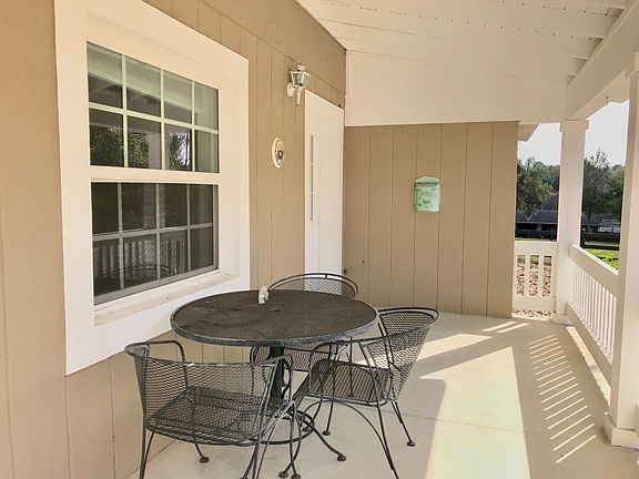 Seating for three on you_re outside porch, overlooking the Koi pond. You can hear the waterfall. Very relaxing and peaceful for your morning coffee or unwinding after work.