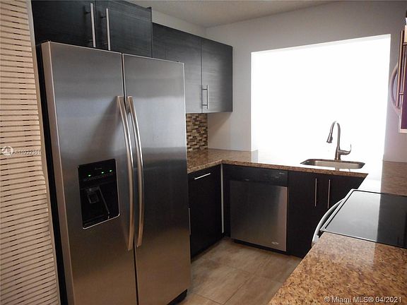 4th image of 9499 Palm Cir N #9499
