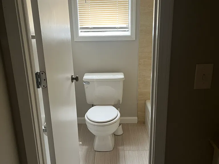 2nd bathroom with tub shower and separate sink