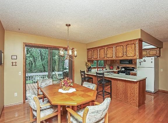 INFORMAL DINING 13 X 10  WITH WALK OUT TO PRIVATE SECLUDED BACKYARD AND DECK AREA 21 X 10!