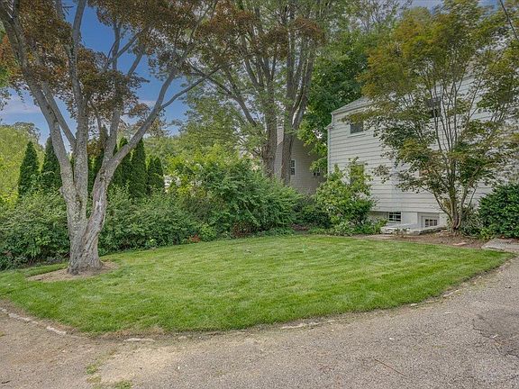 View of the lovely backyard setting at 152 Boulevard in Scarsdale.