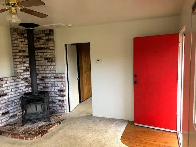 Entry to house and wood stove. Some firewood included.