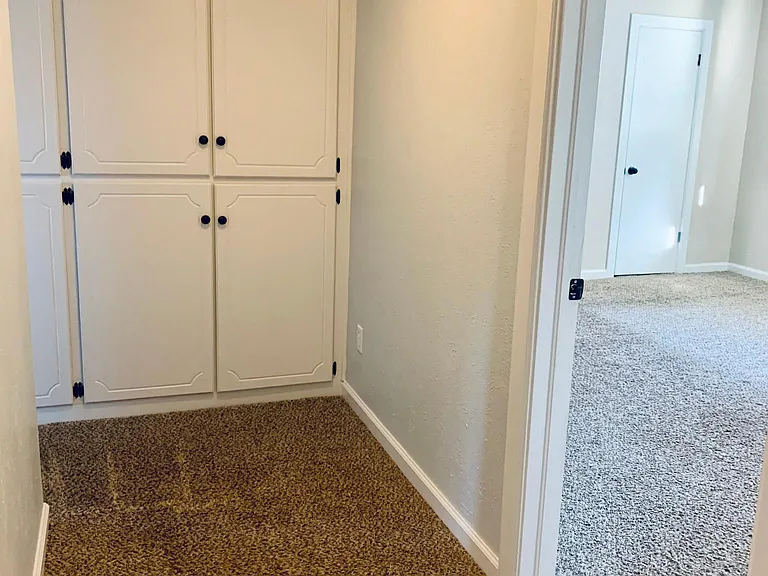 Upstairs hall storage + master bedroom