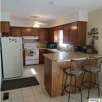 Bar with Spacious Kitchen