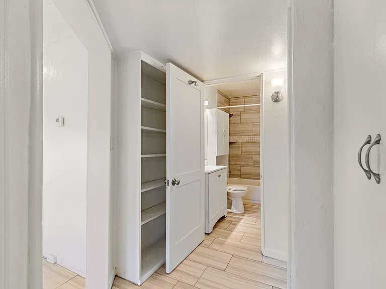 Front hallway off LR, storage, full bath, 2 bedrooms.
