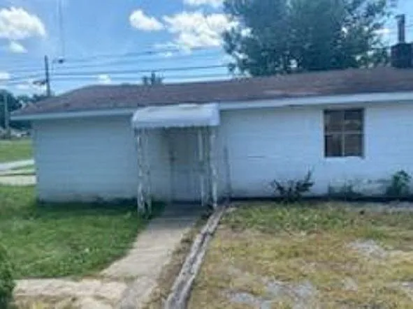 Side view of Garage with additional parking space
