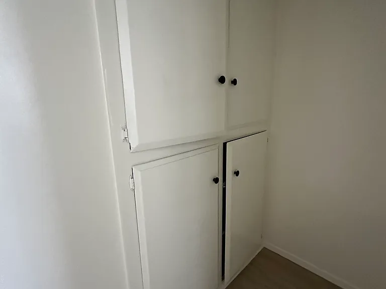 Lots of cupboards in this area for storage