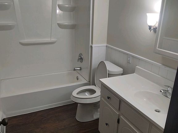 Full bath upstairs between the 2 bedrooms: New sink, faucet, counter top and toilet