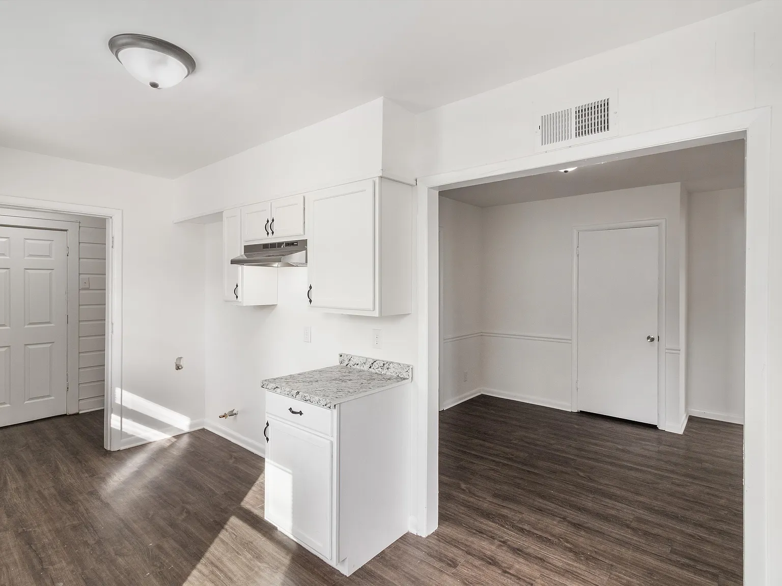 Freshly Updated 4BR White Brick Home with Carport & Fenced Yard — Photo 3