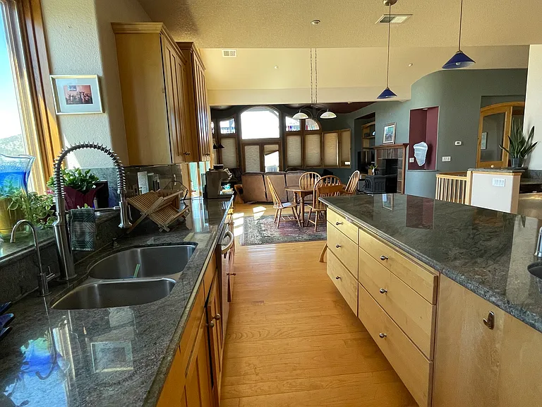 Granite countertops and custom cabinets.