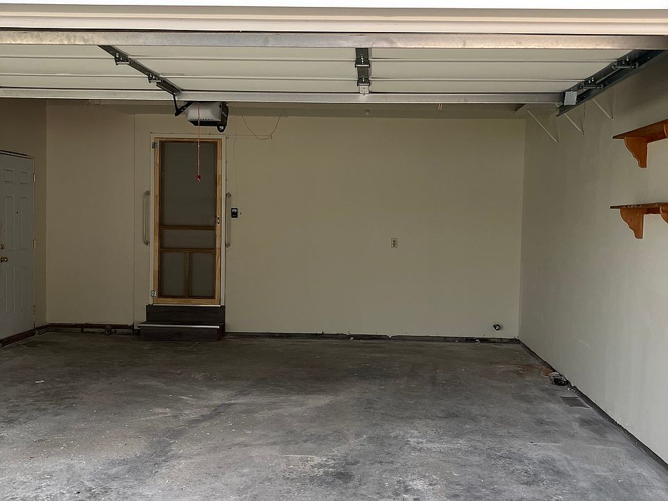 Two car garage complete with your own water spigot so you do not have to wait in line at the car wash to have a clean car!