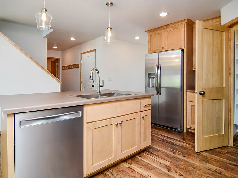 Kitchen island with dishwasher, sink and disposal