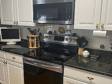 Stainless appliances and granite counter tops