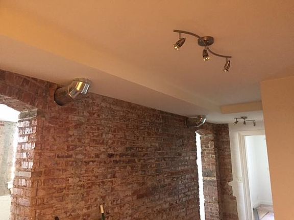 Exposed brick, light and airy