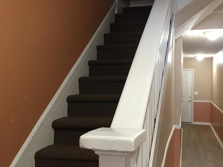 Stairs to upper unit.
