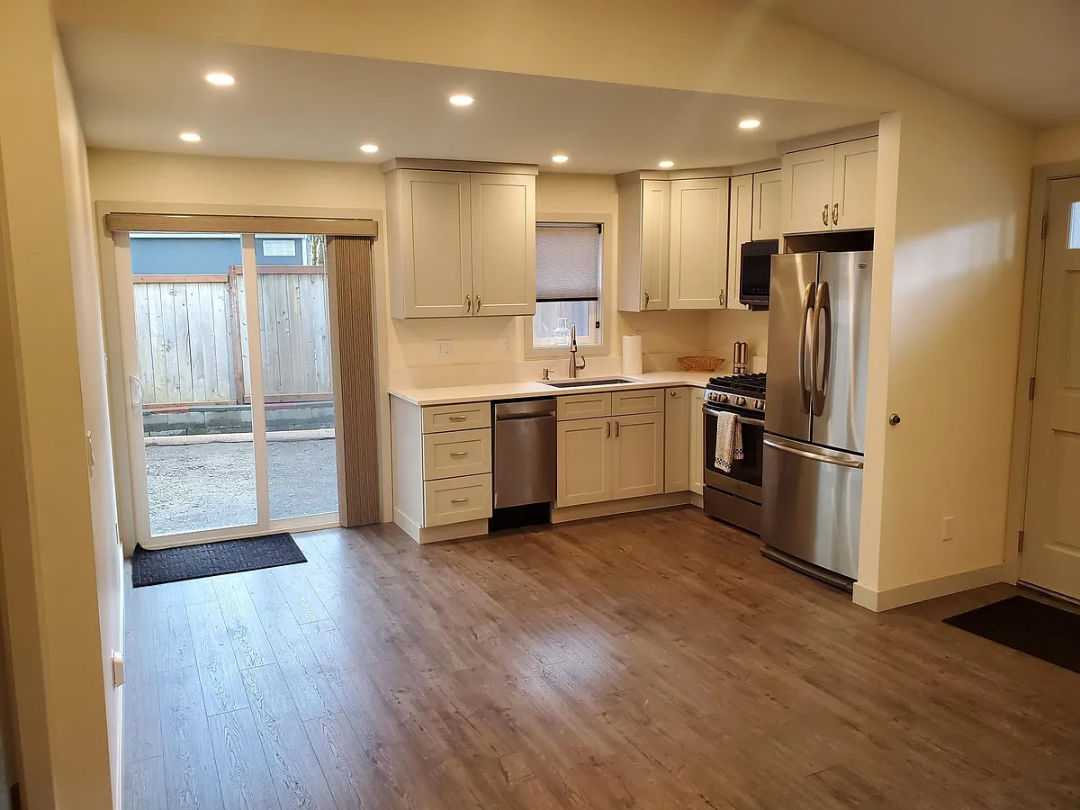 Kitchen- taken before back Patio concrete was poured, see other images included for finished - 13209 NE 97th St #A