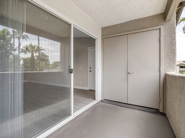In the private patio area, you'll find a convenient closet that houses the in-unit washer and dryermaking laundry days easy while keeping your living space tidy and efficient.