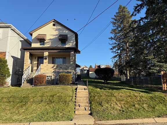 Welcome to 505 Orchard Street, a character-filled 2-bedroom, 2 bath home featuring almost 9-ft ceilings, exposed brick accent, and tons of natural light.