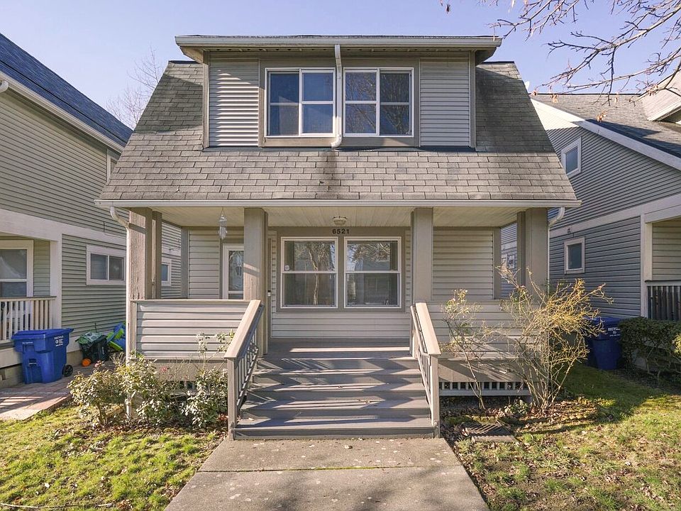 Craftsman style with large front porch.