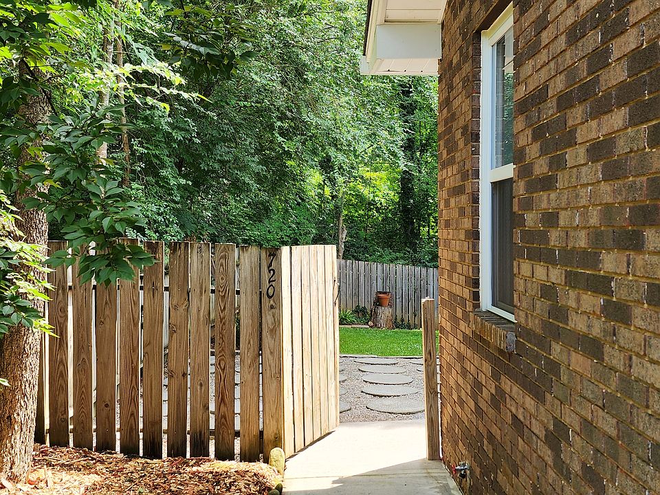 Sidewalk to gate of back unit - fully fenced backyard
