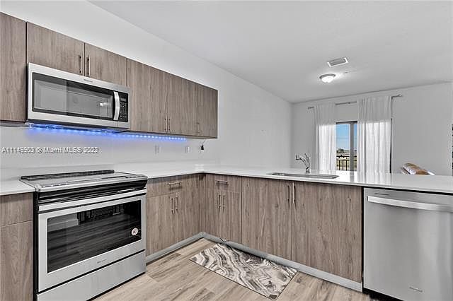 1st image of 15650 SW 136th St #200