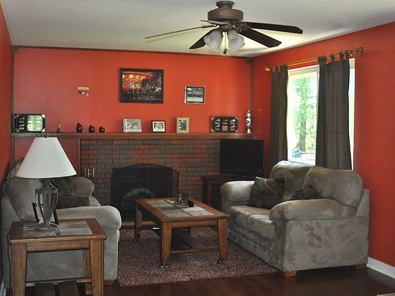 Fireplace and built-in bookcase in living room