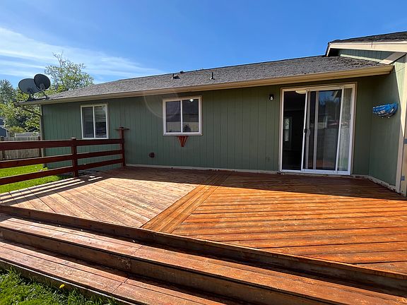 Patio with large fenced yard