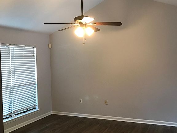 Living room with vaulted celings