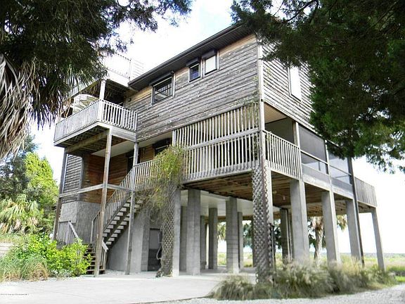 Multi Level Waterfront Home with Many Decks