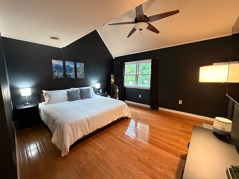 Main bedroom with en suite bath and loft with extra storage closet.