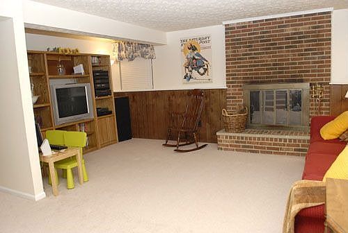 Family Room with Brick Wood-Burning Fireplace