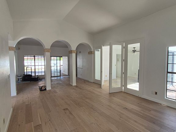 Living room looking toward back yard and pool