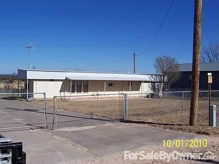 TRAILER FOR SALE!!! : This sits on the property underneath a "cover".
