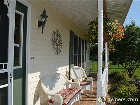 Wrap around porch with auto watering system for plants