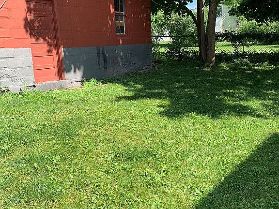 Backyard and garage side