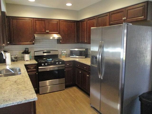 Fully equipped kitchen with granite countertops
