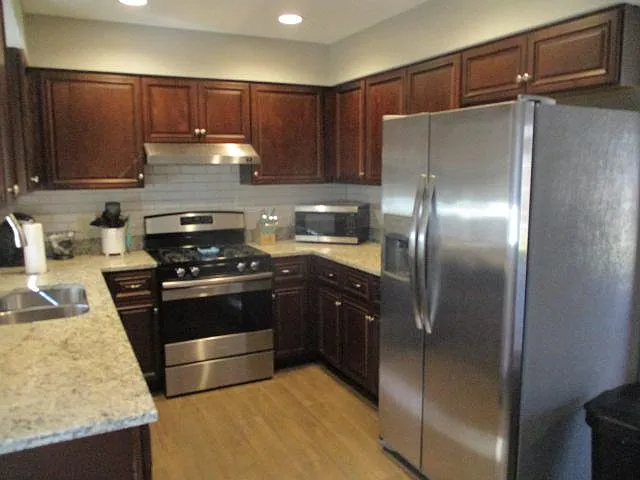 Fully equipped kitchen with granite countertops