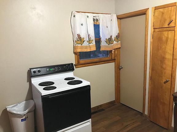 Kitchen, Pantry Closet, Door to Back Yard, Laundry and Deck