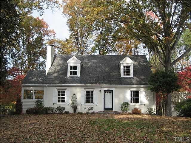 Front of house with large front yard