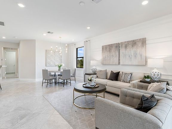 Model Representation Spacious gathering room with diagonal tile flooring