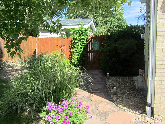 Front-west gate to back yard