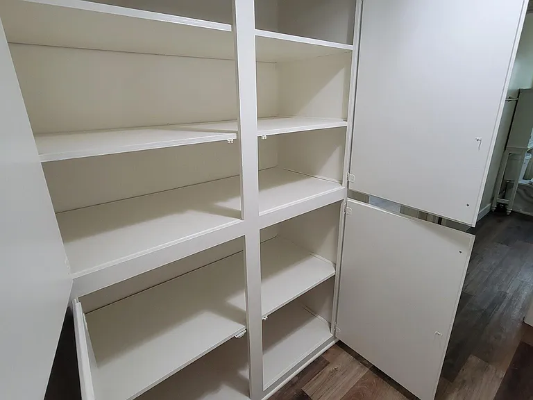 Inside hallway linen closet